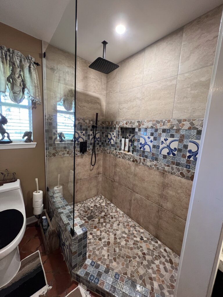 A beautiful shower and full bathroom remodel completed by Bandera Construction Co.